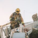 Firefighters on ladder